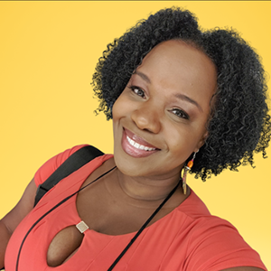 Woman with short curly hair cropped around her chin